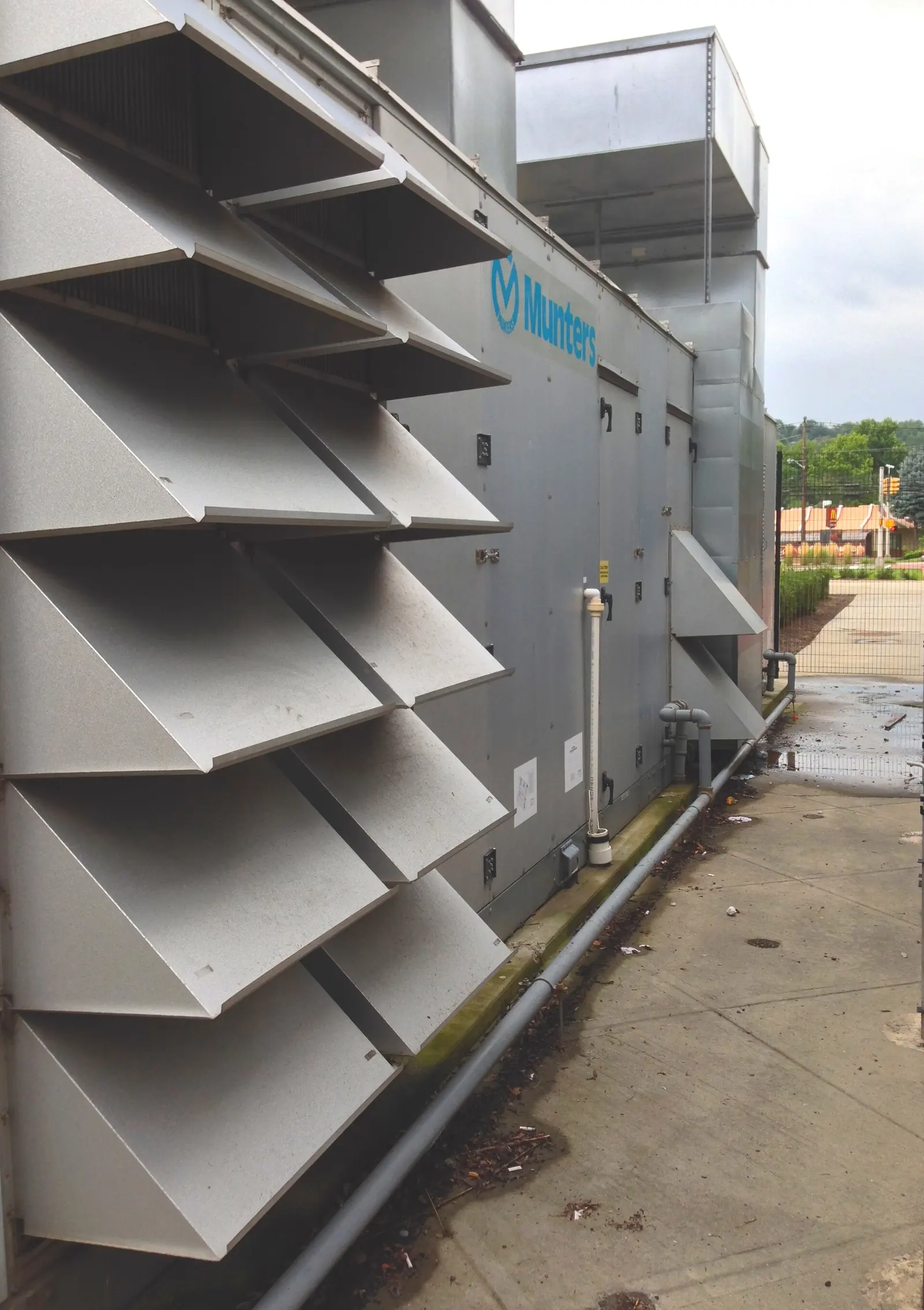 A large commercial dehumidifier used for structural drying. Shown on area, cost, and FAQ pages for Syracuse, NY.